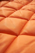 Quilted orange lining texture, lightweight padded detail