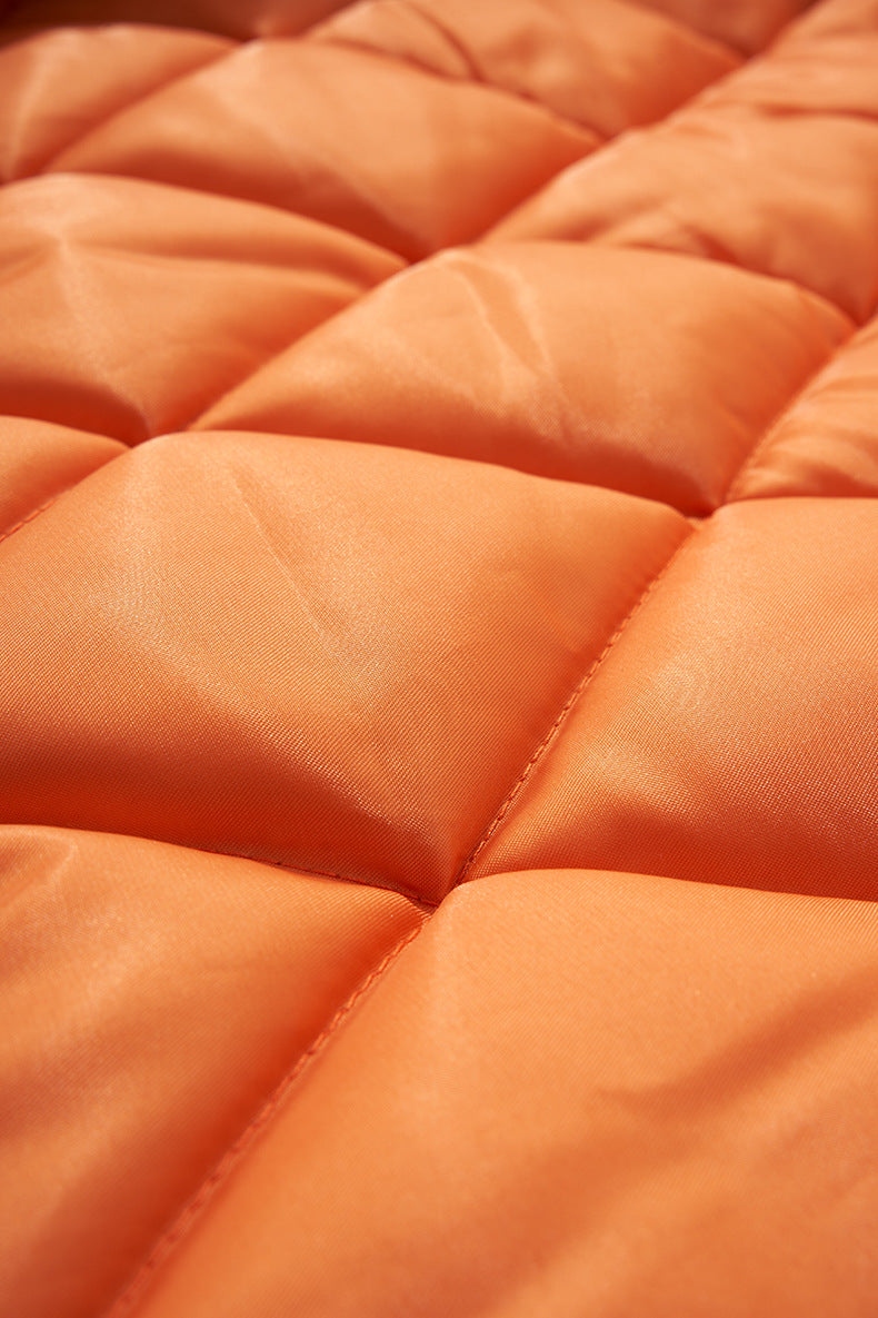 Quilted orange lining texture, lightweight padded detail