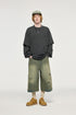 Man in oversized carbon gray long sleeve t-shirt with layered effect