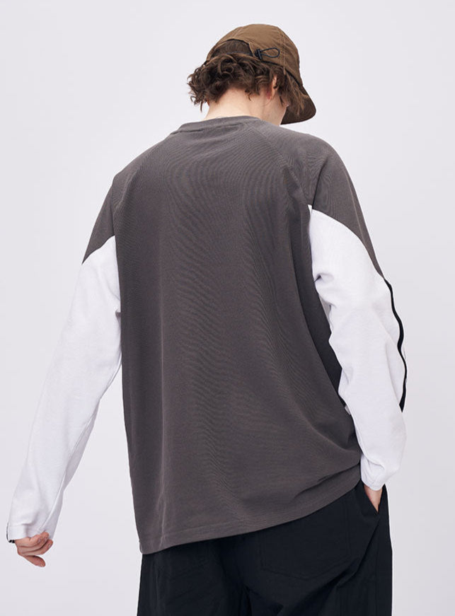 Man back view wearing gray retro contrast long sleeve t-shirt with white sleeves