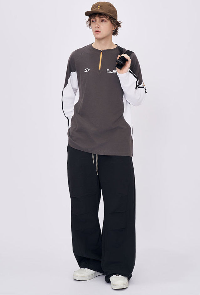 Man streetwear look in gray retro contrast color long sleeve t-shirt