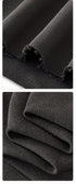 Extreme close up showing 280G french terry loopback fabric texture and distressed raw hem construction.