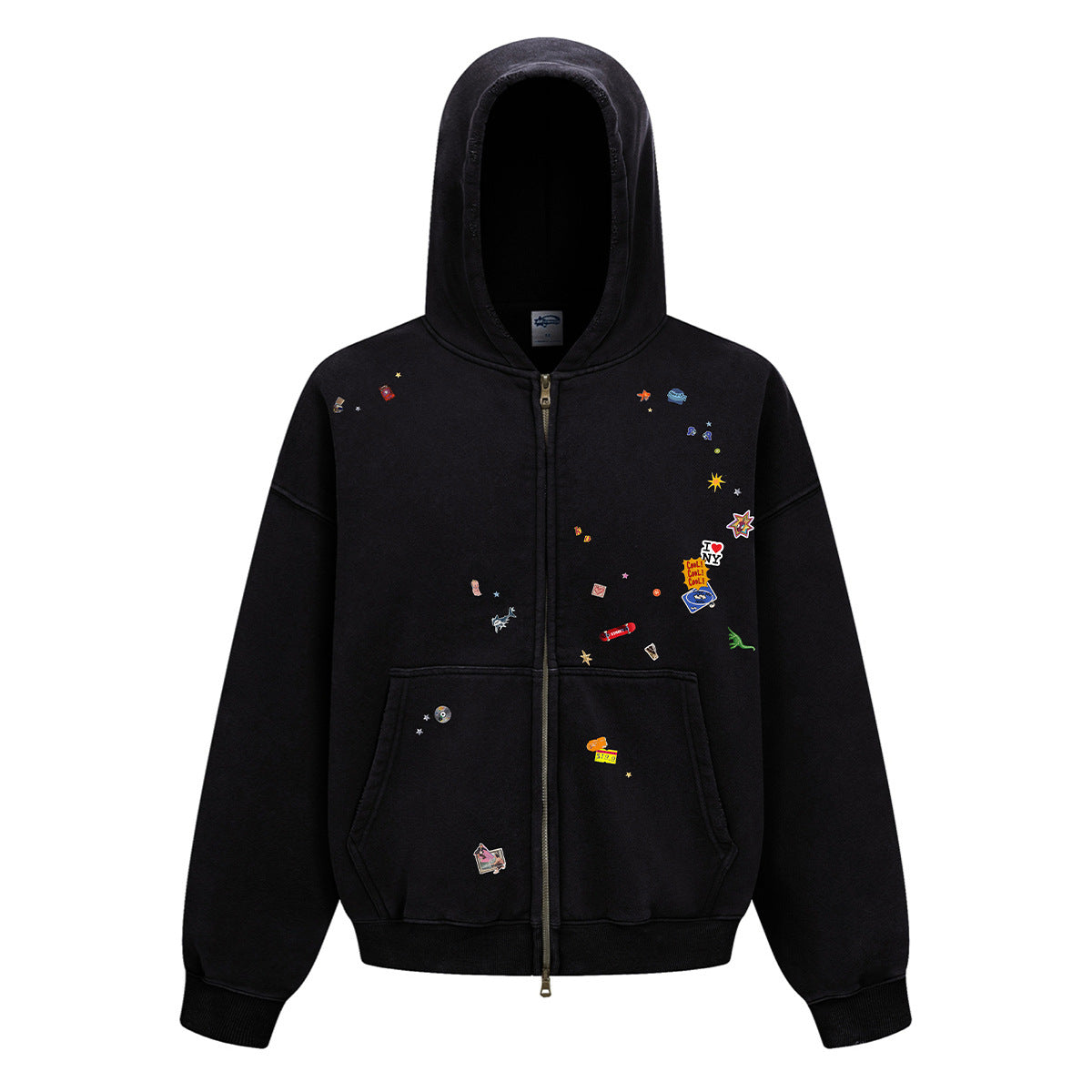 Front product shot of a mens washed black boxy zip up hoodie featuring all-over retro graphic patches on white background.