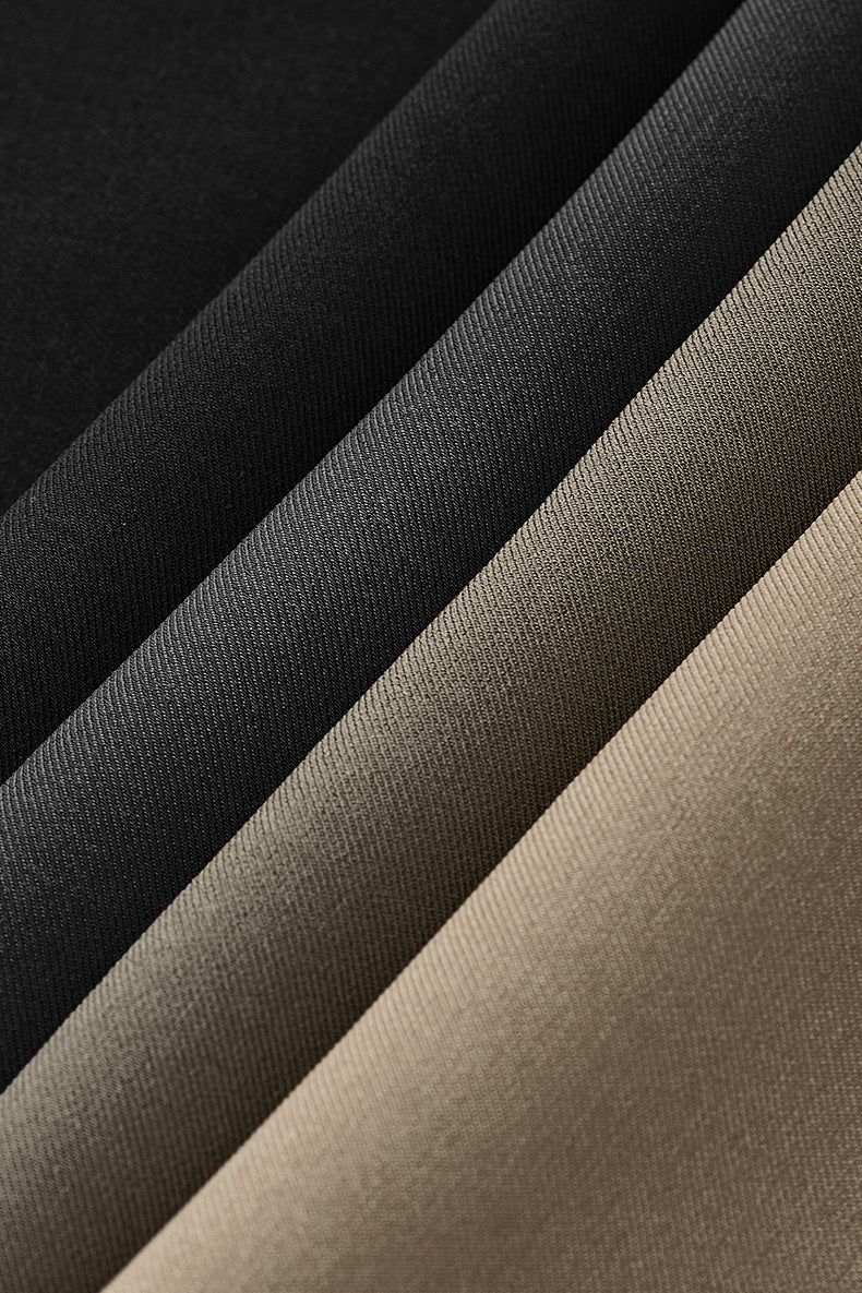 Fabric close-up of 4 different colors of  mens dress pants texture