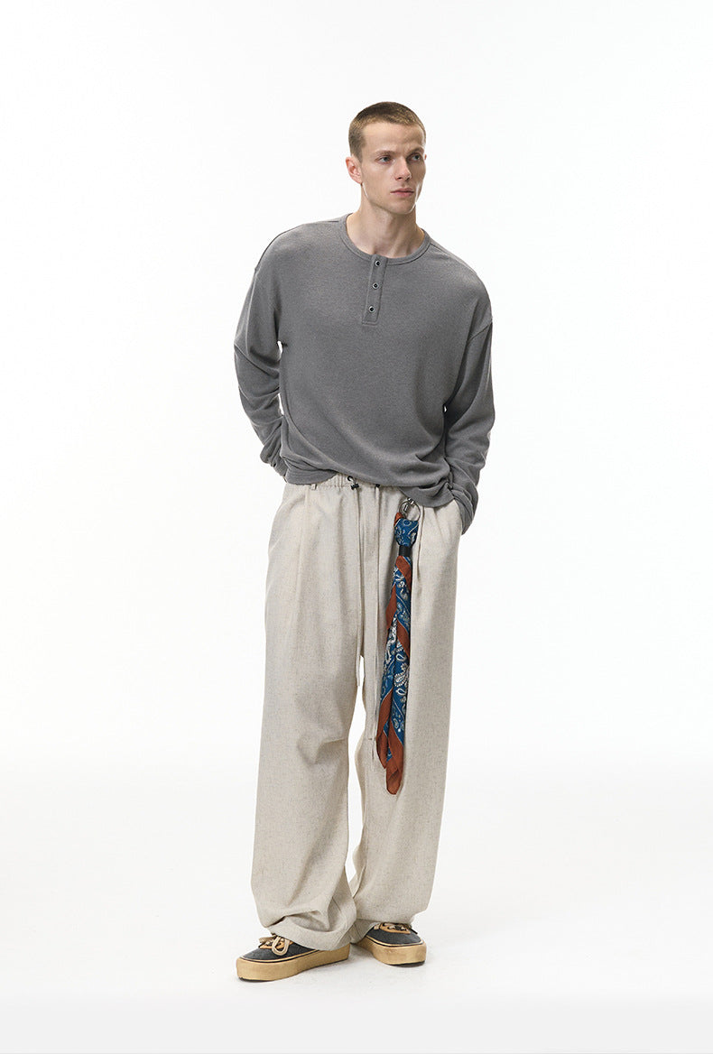 Gray henley long sleeve t-shirt men’s oversized streetwear side pose