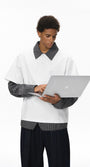 Men’s oversized layered long sleeve polo shirt in white with plaid sleeves, casual campus back-to-school look