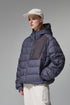 Navy blue men’s puffer jacket side profile with hand pockets
