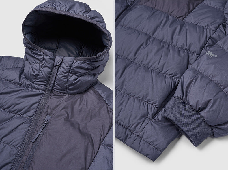 Puffer jacket zipper pull and storm flap close-up