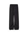 Black men's relaxed drawstring wide-leg pants isolated on white.