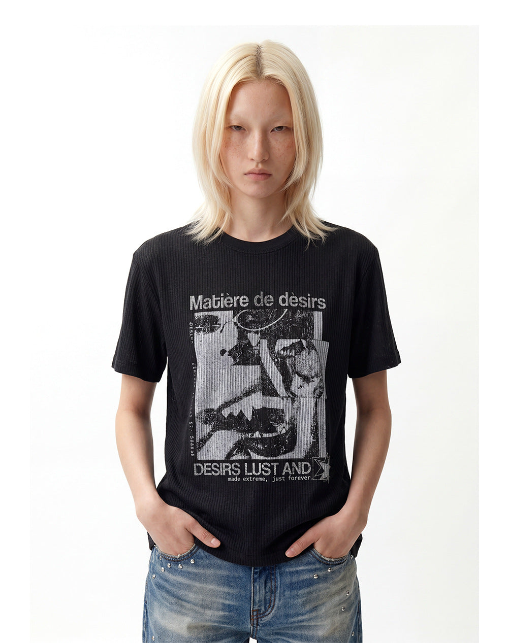 Close front view of black punk graphic tee showing ribbed open-knit texture.