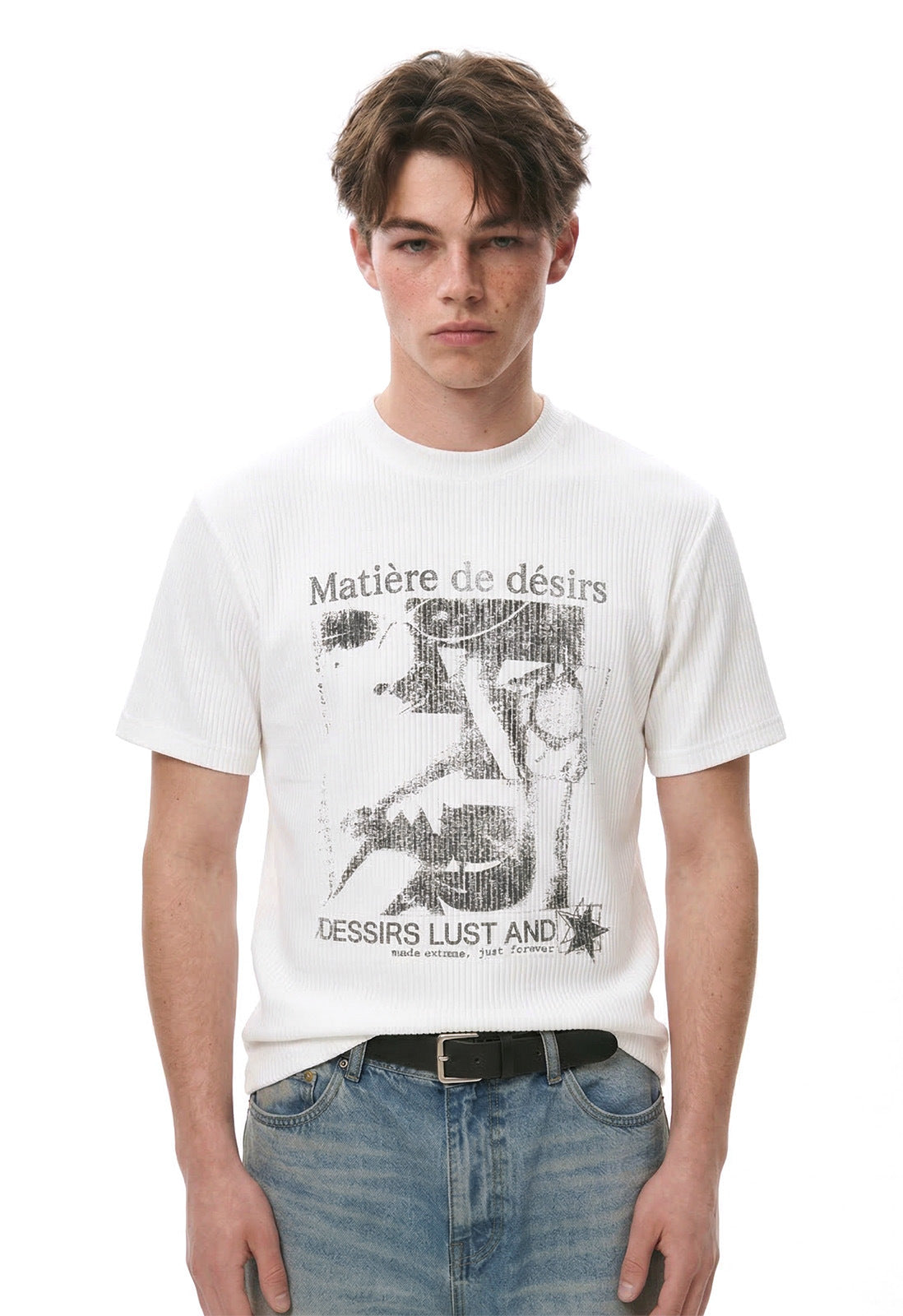 Close view of white crewneck T-shirt with distressed monochrome collage print.