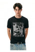 Black fitted graphic T-shirt showing semi-sheer ribbed texture and short sleeves.