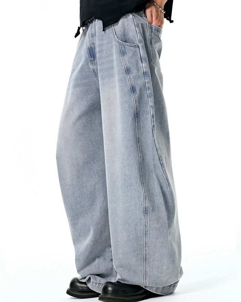 Light blue wide leg jeans side step, relaxed drape
