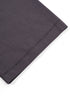 Hem detail of dark purple 'Never Give Up' tee