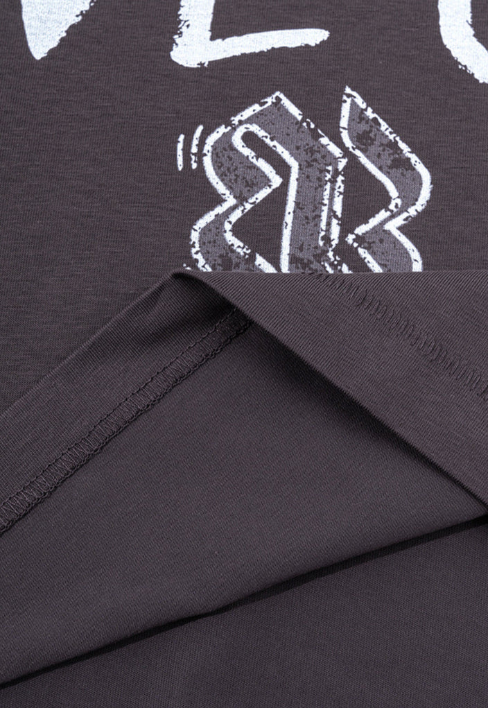 Inner stitching and logo print of dark purple tee, close-up view