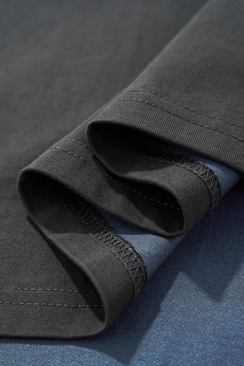 Close-up fabric and sleeve hem gray "NO More Ideas" long sleeve tee