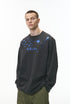 Male model wearing gray "NO More Ideas" streetwear long sleeve tee