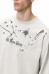 Close-up of off-white "NO More Ideas" graphic print on long sleeve t-shirt