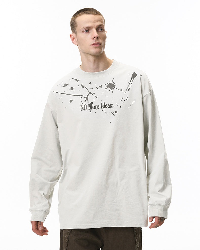 Male model wearing off-white "NO More Ideas" streetwear long sleeve tee