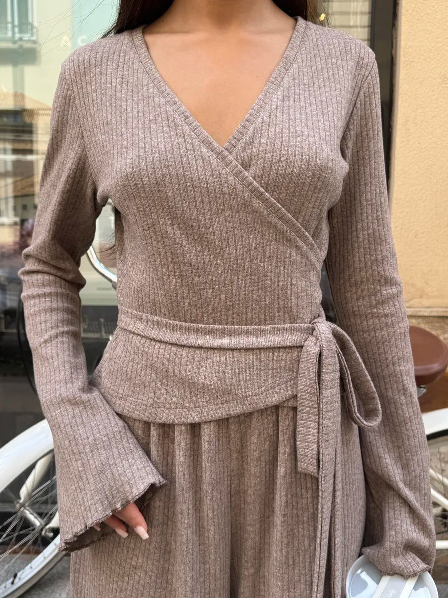 close-up oatmeal ribbed wrap crop top tied at waist