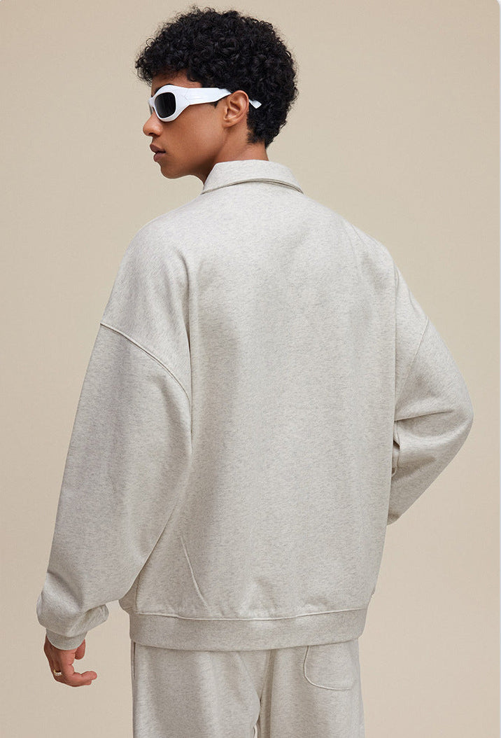 Oatmeal polo zip up, back view with dropped shoulder