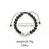 Black gemstone bracelet with size and weight details.