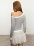 back three-quarter view, gray off shoulder top, slim fit, contrast cuffs and hem