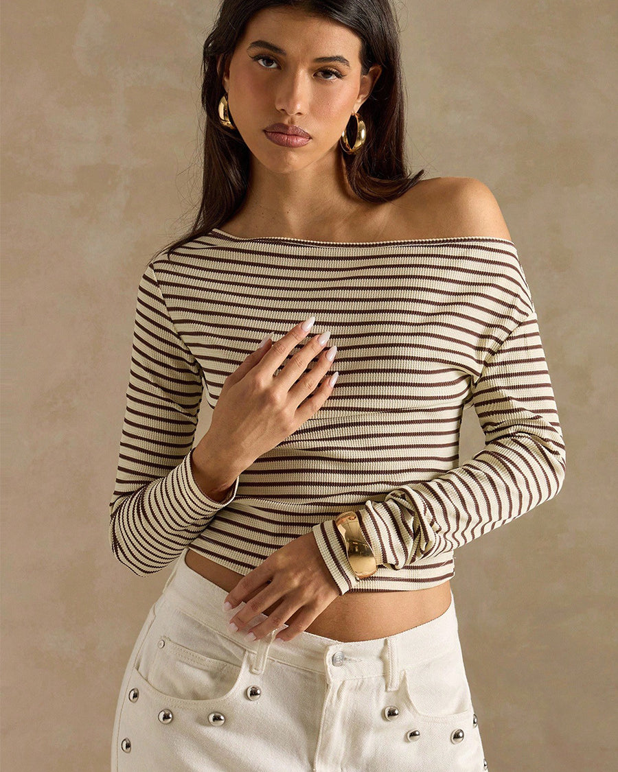 khaki striped off shoulder top front view, rib knit long sleeve, white studded jeans, gold hoop earrings