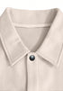 Off-white wool jacket lapel collar and button close-up