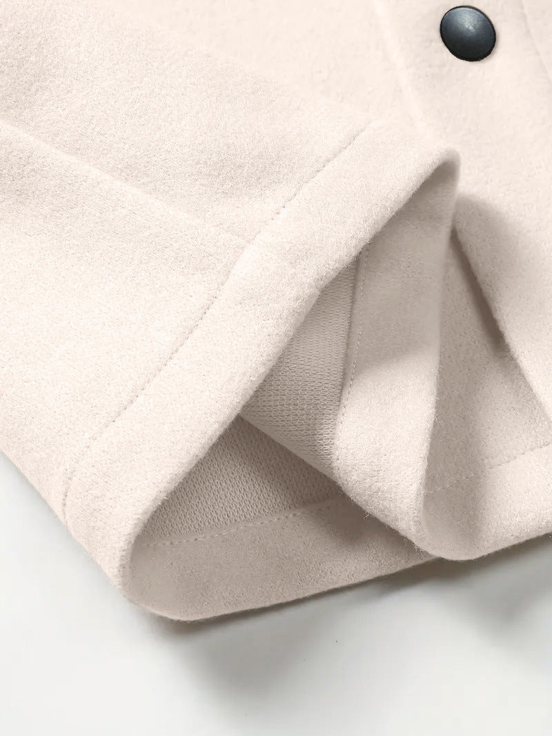 Off-white wool jacket sleeve hem close-up