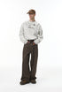 Model in off-white "NO More Ideas" oversized long sleeve t-shirt full body