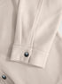 off-white wool jacket cuff and snap button close-up