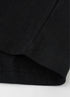 Close-up of black tee hem stitching