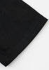 Close-up of black tee sleeve stitching