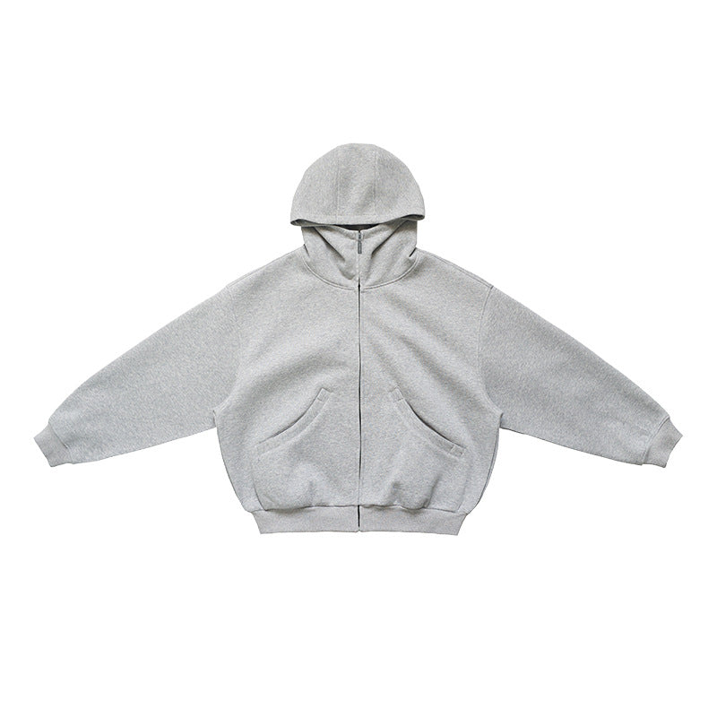 Product shot of heather gray high neck oversized full zip sweatshirt jacket laid flat.