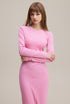 Pink long sleeve bodycon dress, ribbed knit maxi, close-up of waist shaping