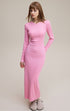 Pink long sleeve bodycon maxi dress, three-quarter angle with side slit