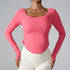 Peach pink women’s long sleeve workout top with slim fit