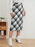 plaid a-line skirt high waist commuter outfit walking pose