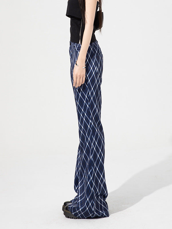 Blue plaid flared pants shown from the side to highlight fit and silhouette.