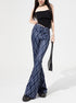 Side view of blue plaid wide-leg pants with fitted waist and bold checkered pattern.