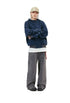 Washed navy plaid hood zip-up hoodie styled with wide gray jeans and a long white tee