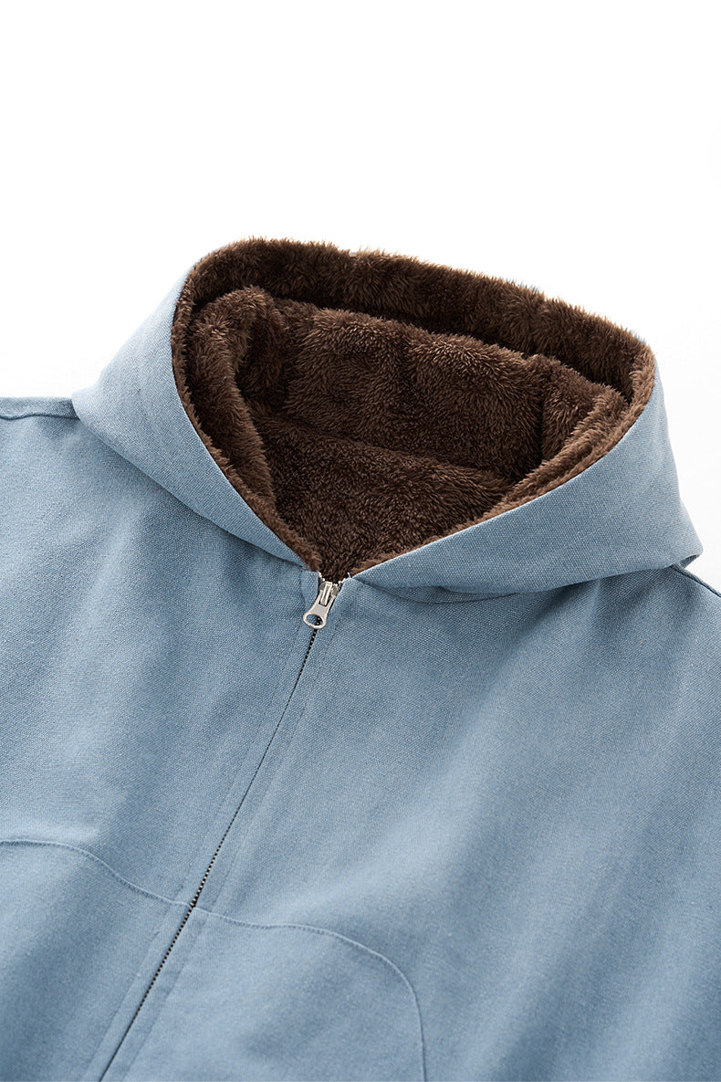 Blue plush zip jacket, hood and collar close-up.
