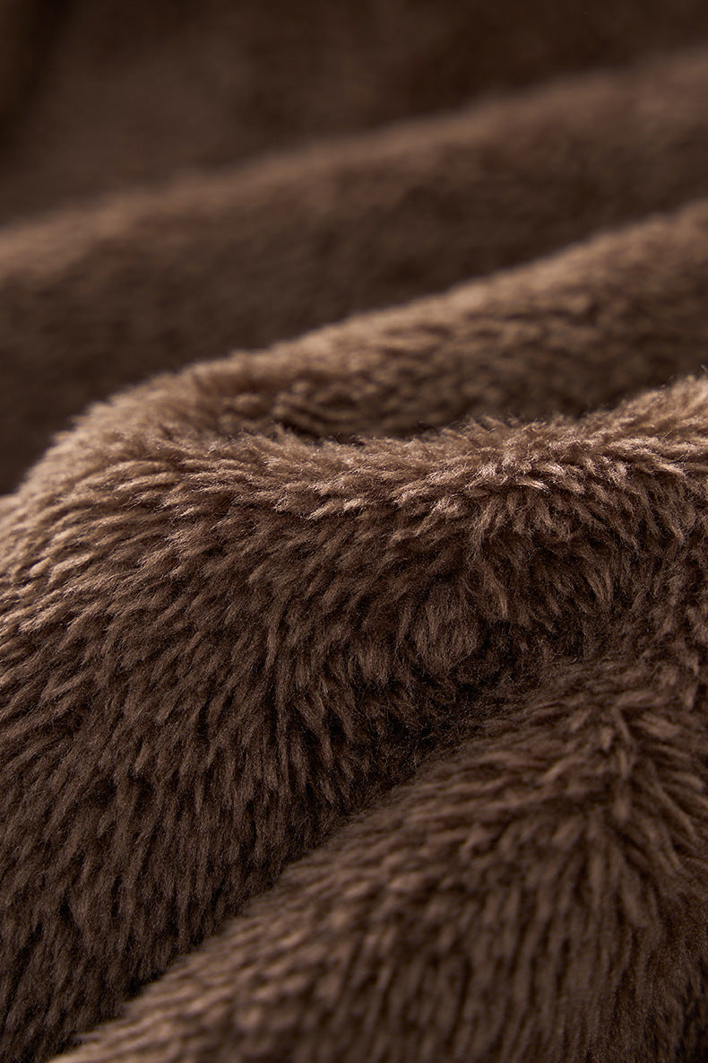 Brown fleece lining texture close-up for plush jacket.