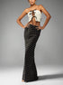 polka dot high-waist maxi skirt, black with cream dots, column silhouette, full front view on model