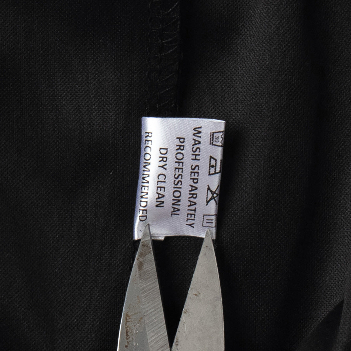 PU leather pants label and stitching close-up