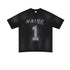 Black oversized T-shirt laid flat with 'Raise Fares' and number 1 print