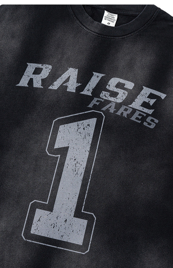 Close-up of front chest print with 'Raise Fares' and large distressed number 1 graphic.