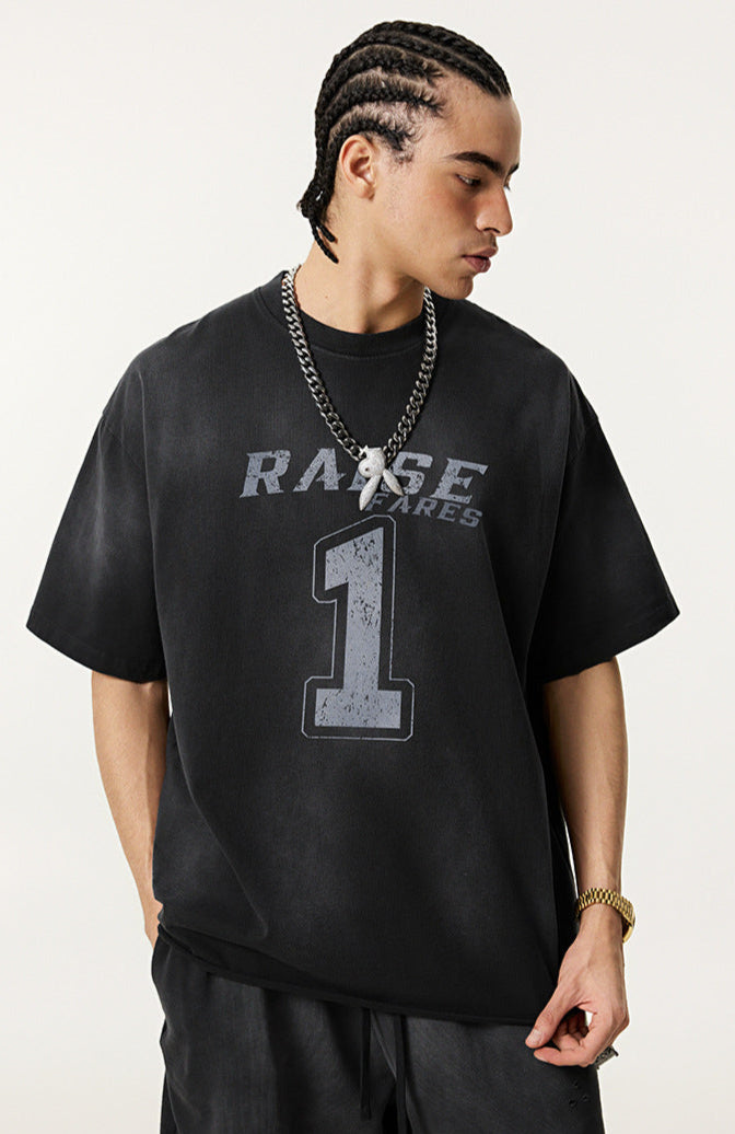 Model looks to side while wearing black T-shirt with distressed number 1 and 'Raise Fares' graphic