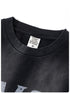 Close-up of T-shirt collar showing inner neck tag with brand label 'BE THRIVED'.